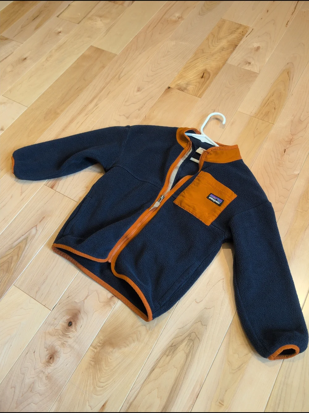 Patagonia Navy Fleece Jacket with Orange Trim - Picture 2 of 3